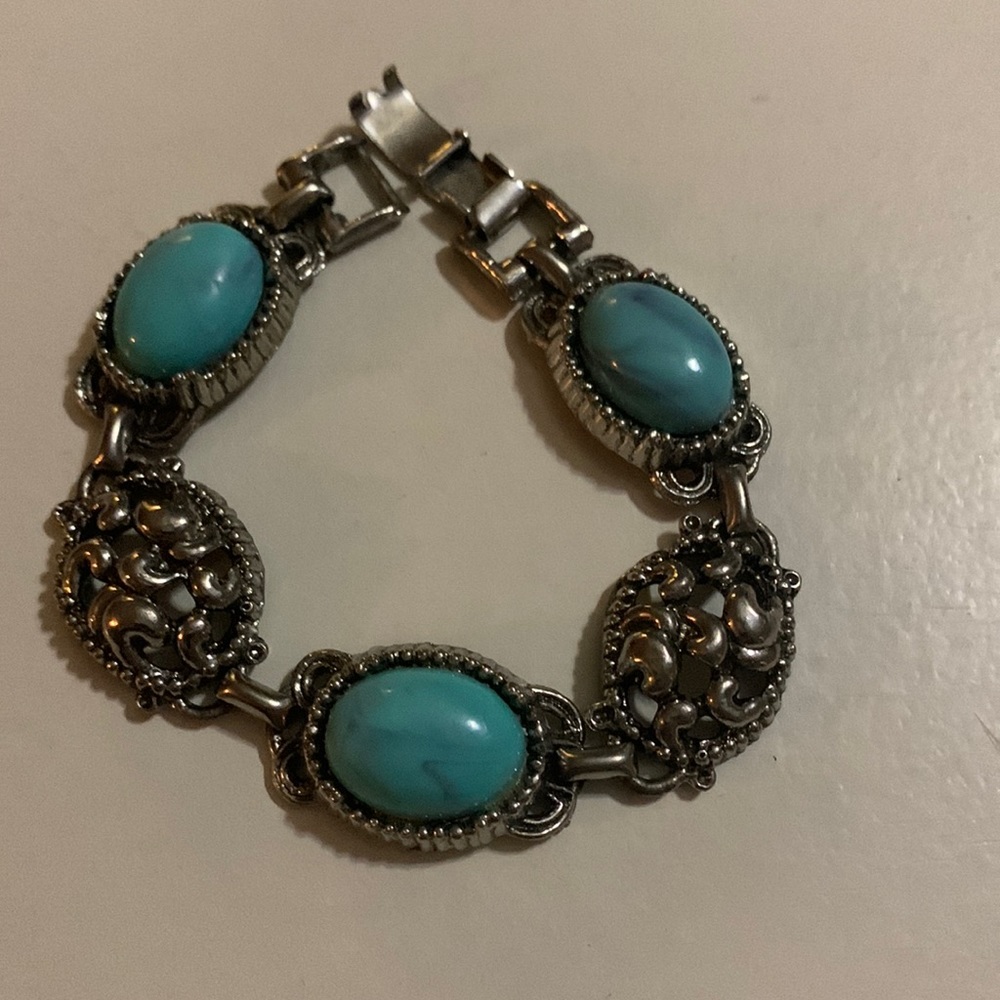 Silver and turquoise bracelet.